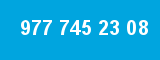 977 745 23 08